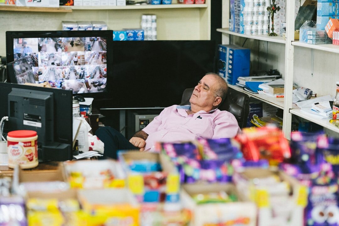 store security guard watching monitors